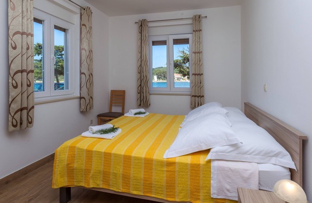 Apartamento de una habitación en la playa Veli Rat, Dugi otok (A-11525-a)