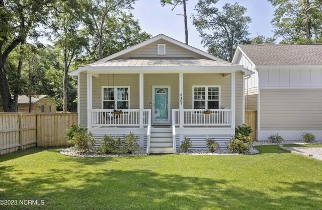 Only TWO MILES to the beach! Custom bungalow. Fenced-in yard!