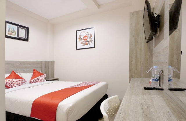 OYO 646 Kvinn Kostel