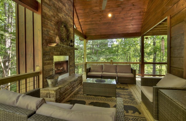 Papa Bear Lodge is a Pet-friendly haven featuring hot tub, outdoor fireplace, firepit, pool table, WiFi, and secluded ambiance for unparalleled relaxation