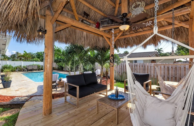 Casa de playa perfecta! Grandes 3/2 con piscina climatizada, Lanai cubierto y 2 metros de la playa