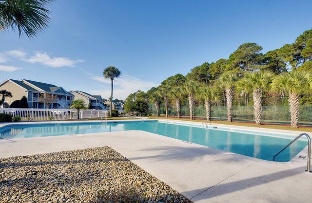 Pond Views & Community Perks: Sunset Beach Condo!