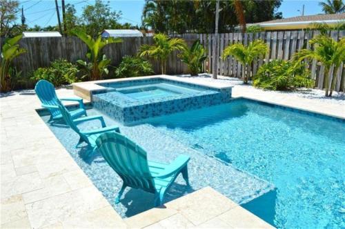 Private heated pool , resort style home , minutes from the beach