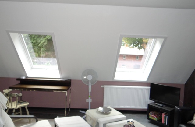 Quiet, spacious and light-flooded apartment/loft with large courtyard garden