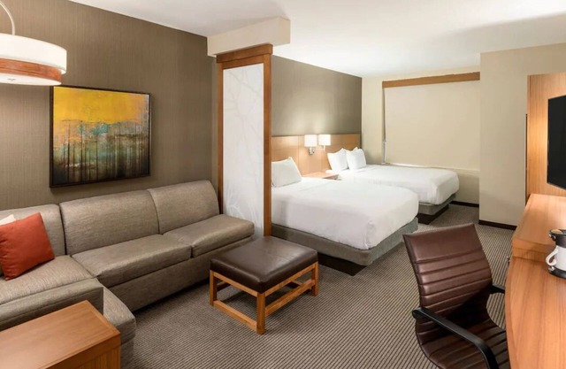 Relaxing 2 Queen Bed Stay Near Peace Center! Onsite Gym and Pool Access!