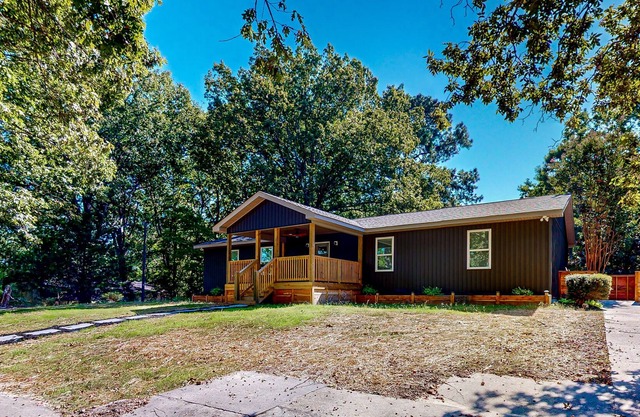 Renovated home with covered deck, fireplace, & all-new interior