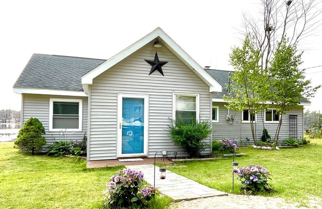 Lakefront Cottage renovado en sereno lago todos los deportes