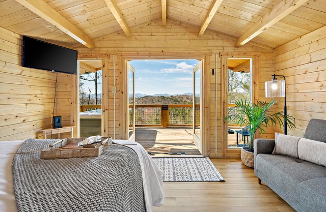 Romantic Treehouse with Hot Tub, Waterfall, Hiking, Swinging Bridge & Goats