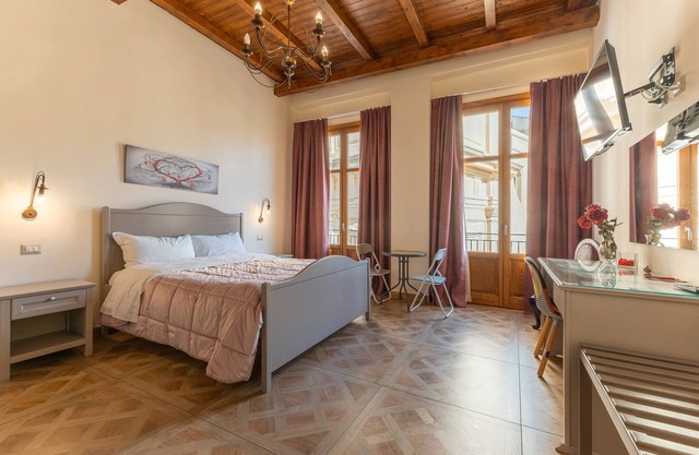 Habitación 'Al Duomo - Camera Queen' con terraza compartida, Wi-Fi y aire acondicionado.