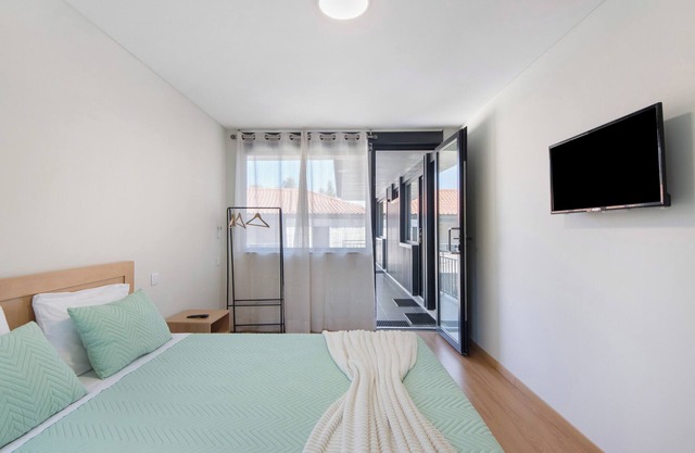 Habitación 'Quarto 7' con vistas a la montaña, Wi-Fi y aire acondicionado.