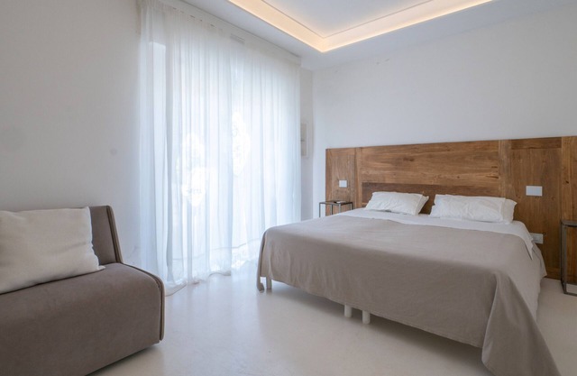 Habitación 'Valentino - 03' con terraza compartida, Wi-Fi y aire acondicionado