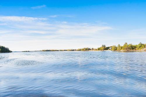 Rustic Lakefront Cottage with Fire Pit & Scenic Views