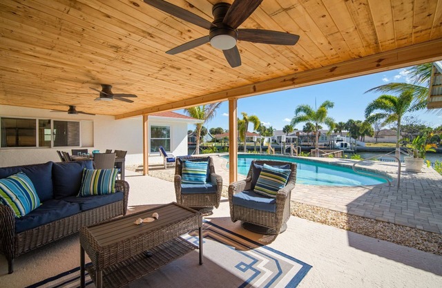 Saltwater canal front 4 bedroom tropical home with private pool and boat dock