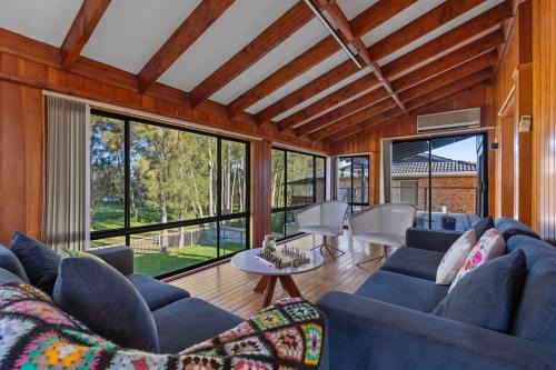 San Remo Charm with Waterfront Views and Sunroom