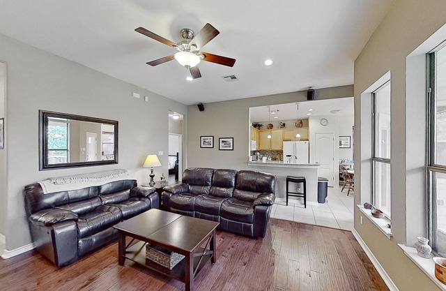 Scenic retreat with fenced yard, patio, central AC, & washer/dryer