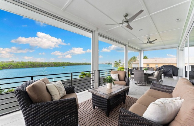 Seafoam Serenity - Bayfront Retreat w/ Dock, Pool & 1 Min Walk to Bonita Beach
