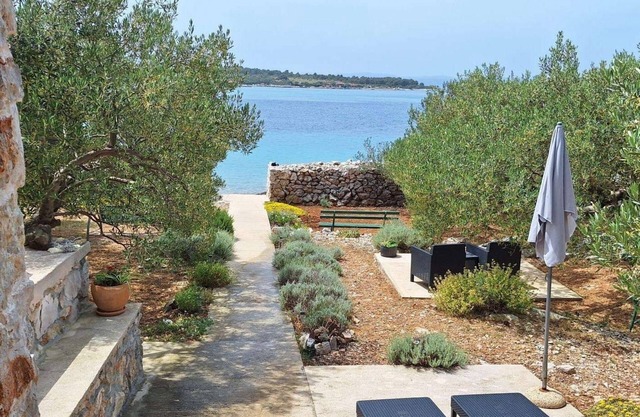 Casa de pescador para vacaciones junto al mar Bahía Druce, Pasman (K-23356)