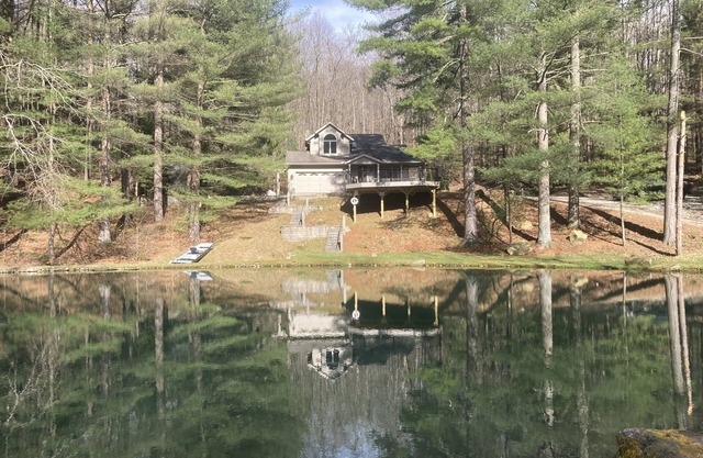 Secluded Fully Furnished Home with Deck overlooking a Pond