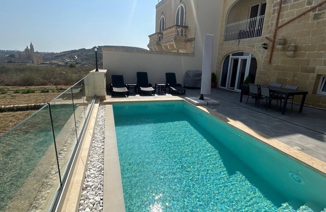 Serena Farmhouse is a Rustic and spacious 5-bedroom with pool and jacuzzi.