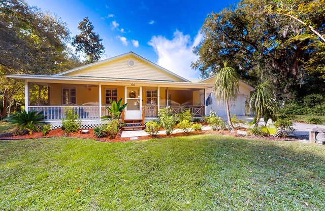 Serene home with enclosed yard, grill, games, & central AC - dog-friendly