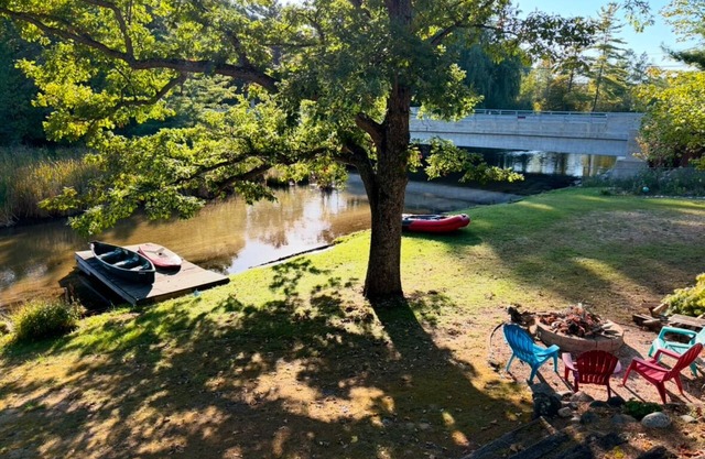 Serene, Spacious Riverfront Home close to Torch Lake with lots of Entertainment