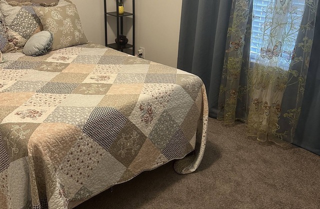 Single bedroom, double bed, private bathroom. Full access to living areas.