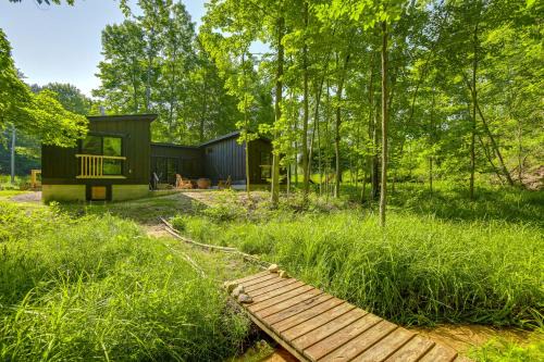 Ski and Unwind Cozy Creekside Cabin in Glen Arbor!