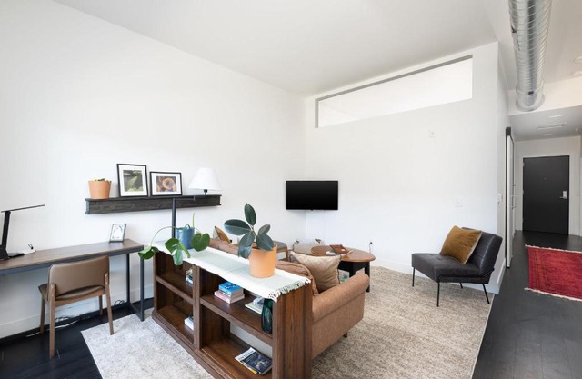 Skywalk to Fiserv 1BR with Rooftop, Gym, and Parking