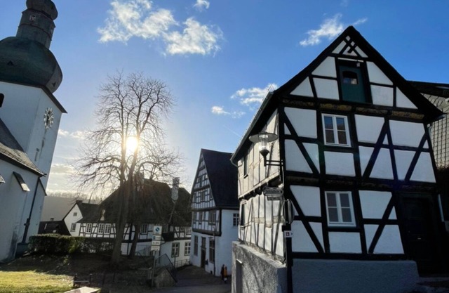 Small community center at the bell tower in the middle of the historic old town
