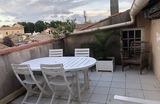 Small rooftop apartment in the city center, large roof terrace, silence