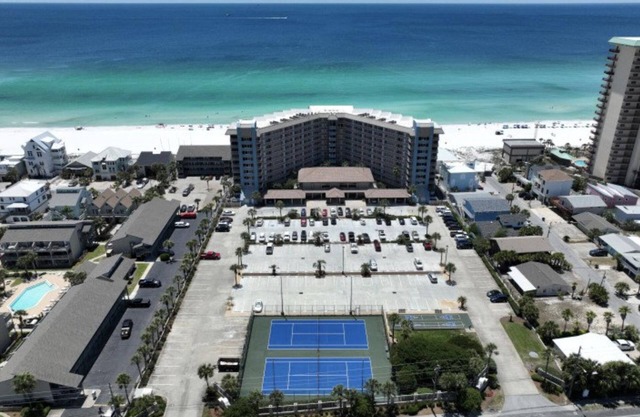 Spacious 3-bedroom condo end unit with wrap around balcony 6th floor west view