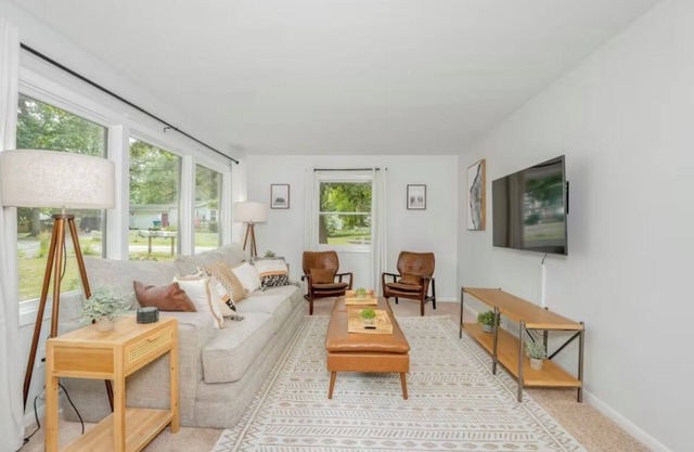 Spacious 4-bedroom house on Gun Lake with private hot tub.