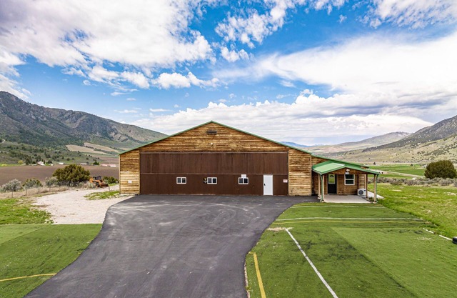 Spacious aviation themed home w/ spectacular views.