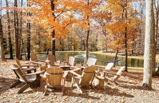 Spacious, family-friendly lodge on 10 wooded acres. Sleeps 20 with 5 bedrooms, stocked pond