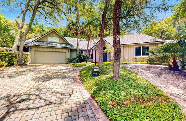 Spacious home with patio, deck, private outdoor pool, & beach access