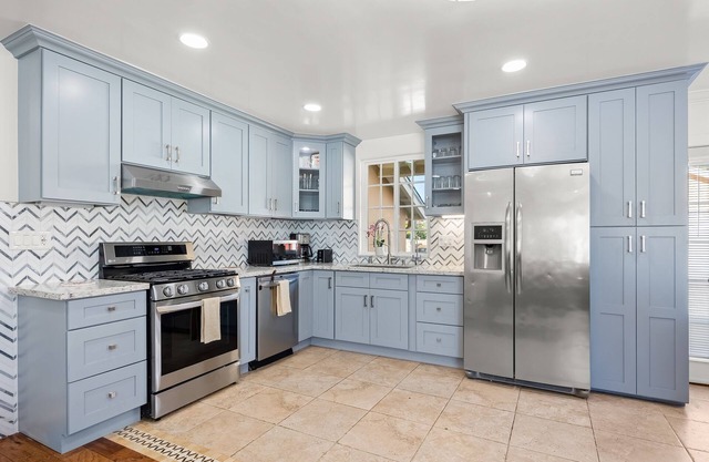 Spacious, single-level home with a large yard, gas fireplace, & washer/dryer