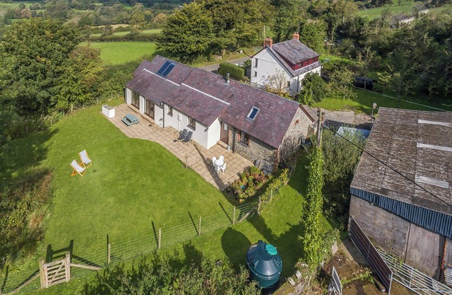 Spacious Teifi Valley barn for holidays near the Cardigan coast.