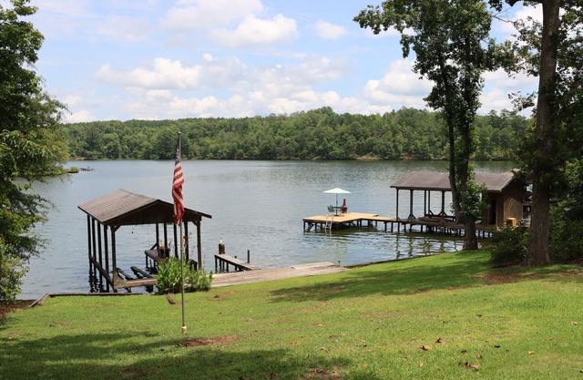 Spend Lake Daze at Lake Sinclair retreat w/ renovated basement and private dock!
