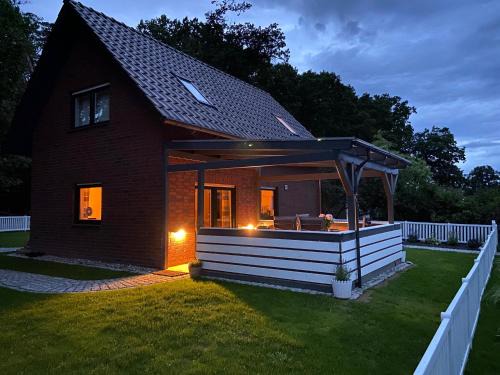 Strandhaus Mathea - ruhige Lage direkt am Fleesensee - Parkplatz, Kamin, Sauna - familienfreundlich