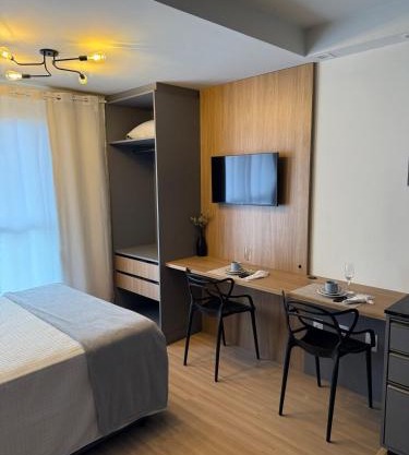 Studio aconchegante, moderno e completo