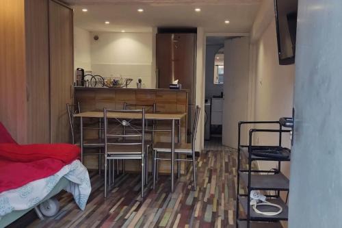 Studio fonctionnel avec espace extérieur partagé