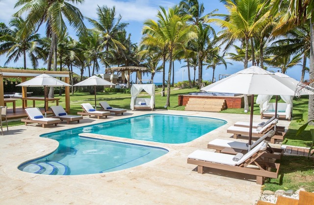 Impresionante propiedad frente a la playa con 14 camas. ¡Perfecto para familias múltiples y reuniones!