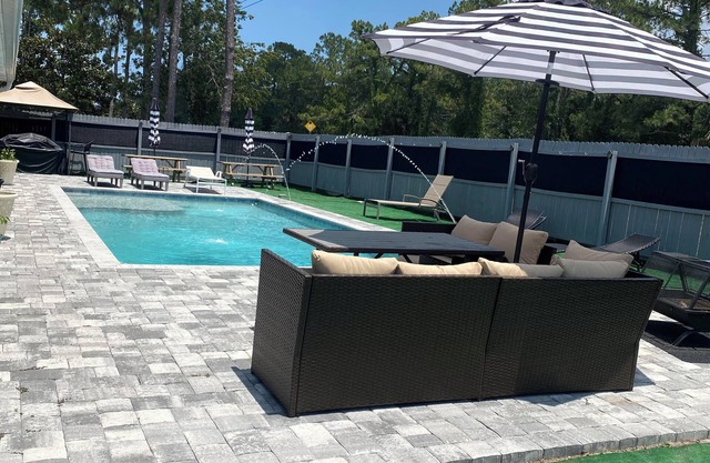 Stunning Modern beautiful house in Palm Coast, FL. W/ Heated Salt Water Pool.