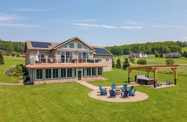 Stylish Lake Stay w/ Golf, Hot Tub & Fire Pit