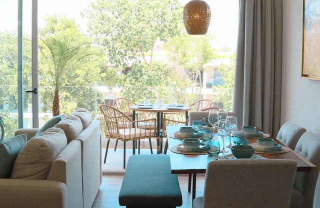 Stylish Playacar Condos w Balcony & Pool