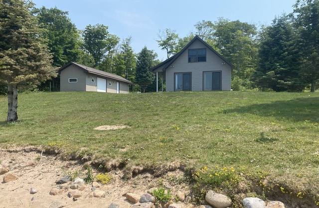 Sugar Island, Michigan: Waterfront cabin with beautiful sunsets and beach.