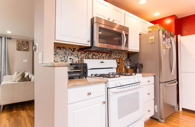 Sunny 3BR home near Boston DT and BC W/ WiFi EV charger, Sauna
