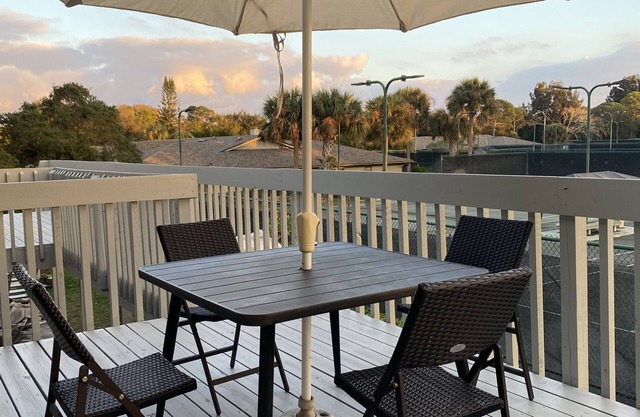 Sunsets and Tennis Views! Totally remodeled condo with private deck