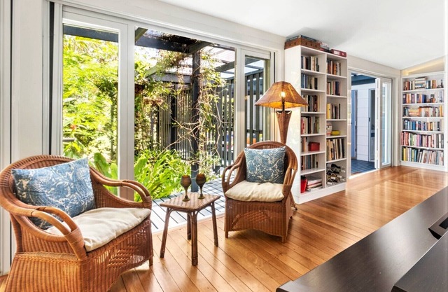 The best of lagoon front and beach living in an original, historic lakehouse