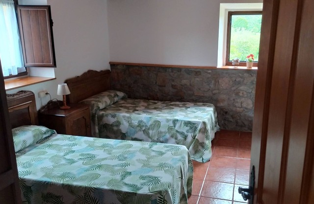 The house offers space for 8 people (4 bedrooms, dining room, living room,